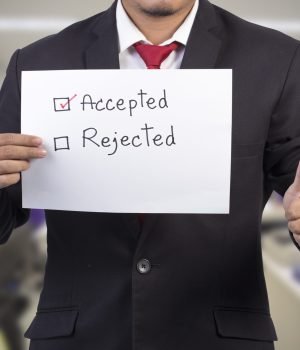 businessman giving a thumbs up gesture of approval and accepted choose office back ground
